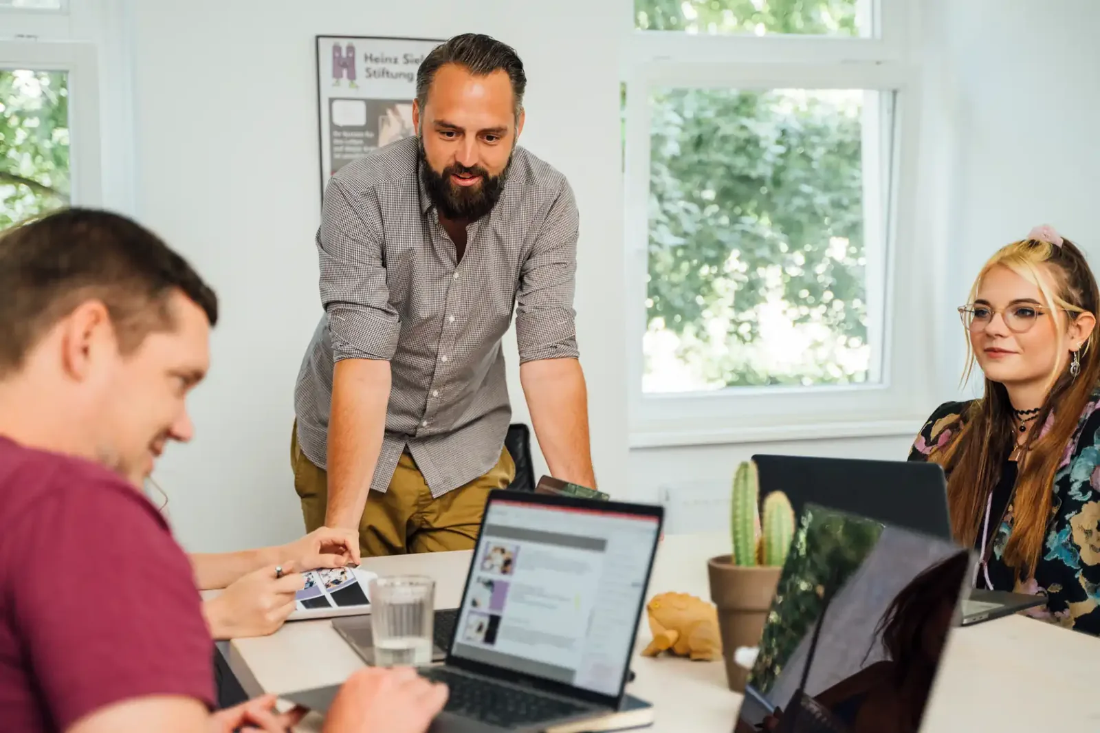 Consultants in conversation at the office